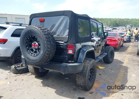 2016 Jeep Wrangler Unlimited Freedom из США, поврежденный, VIN 1C4BJWDG5GL162778
